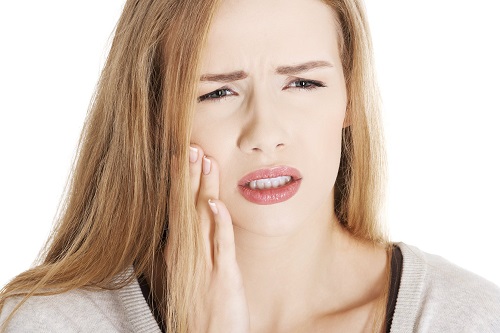 4 lý do dẫn đến trồng răng sứ bị nhức - Tìm hiểu ngay-1